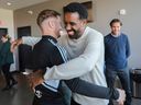 Djordje Mihailovic (left) of CF Montréal and Manager Wilfried Nancy embrace at the club's training facility, Centre Nutrilait, in Montreal Tuesday, October 25, 2022. CF Montréal held a media availability to talk about the 2022 season.