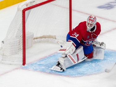 Minnesota Wild right wing Brandon Duhaime (21) scored against Montreal Canadiens goaltender Jake Allen (34) during 2nd period NHL action at the Bell Centre in Montreal on Tuesday Oct. 25, 2022.