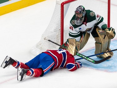 Montreal Canadiens right wing Brendan Gallagher (11) was roughed up by Minnesota Wild goaltender Marc-André Fleury (29) after sliding into the net area during 3rd period NHL action at the Bell Centre in Montreal on Tuesday Oct. 25, 2022.