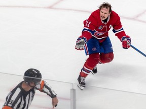 Montreal Canadiens right wing Brendan Gallagher (11) pleaded his case but couldn't get a penalty called after being roughed up by Minnesota Wild goaltender Marc-André Fleury (29) during 3rd period NHL action at the Bell Centre in Montreal on Tuesday Oct. 25, 2022.