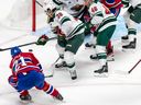 Montreal Canadiens defenceman Kaiden Guhle (21) can't score on the short side against Minnesota Wild goaltender Marc-André Fleury (29) during 3rd period NHL action at the Bell Centre in Montreal on Tuesday Oct. 25, 2022.