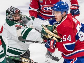 Minnesota Wild goaltender Marc-André Fleury (29) checks Montreal Canadiens defenceman Jordan Harris (54) I front of the net during 1st period NHL action at the Bell Centre in Montreal on Tuesday Oct. 25, 2022.