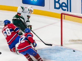 Minnesota Wild center Joel Eriksson Ek (14) scores an empty-net goal during 3rd period NHL action at the Bell Centre in Montreal on Tuesday Oct. 25, 2022 in a 3-1 win over the Montreal Canadiens.