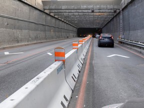 MONTREAL, QUE.: October 31, 2022 -- The southbound Lafontaine tunnel is reduced to one lane as the north bound is reduced to two, in Montreal on Monday, October 31, 2022.