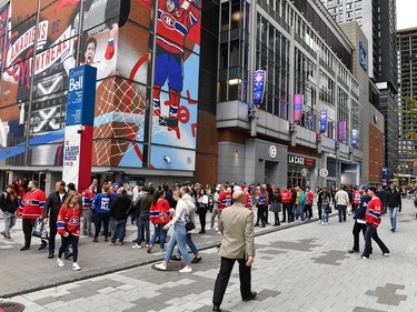 Fans gather around the Bell Centre prior to the home opener between the Montreal Canadiens and the Toronto Maple Leafs at Centre Bell on October 12, 2022 in Montreal.