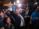 François Legault celebrates Coalition Avenir Québec's re-election Monday night in Quebec City. 