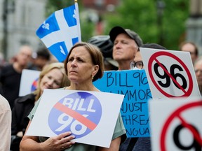Opponents of Quebec's Bell 96 French language law protest in downtown Montreal on May 26, 2022.