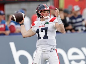 Alouettes quarterback Davis Alexander warms up before a game against the Winnipeg Blue Bombers at Molson Stadium in Montreal on Aug. 4, 2022.