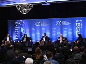 From left to right, Martin Lefebvre, chief investment officer at National Bank Investments, Marie-France Paquet, chief economist at Global Affairs Canada, Mouvement Desjardins chief economist Jimmy Jean and Martin Coiteux, head of economic analysis and global strategy at the Caisse de dépôt, discussed economic forcasts with moderator Mia Homsy on Thursday.