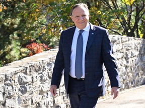 Quebec Premier and Coalition Avenir Québec Leader François Legault walks to a news conference Tuesday, Oct. 4, 2022  in St-François de l'Ile d'Orléans.
