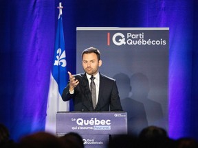 Parti Québécois Leader Paul St-Pierre Plamondon speaks to supporters in Boucherville following his loss in the provincial election to a majority CAQ government on Monday, Oct. 3, 2022.