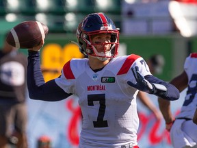 Alouettes quarterback Trevor Harris (7) throws a pitch against the Edmonton Elks in Edmonton on Saturday, Oct. 1, 2022.