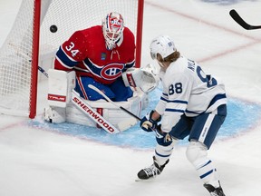 Maple Leafs' William Nylander scores on Canadiens goaltender Jake Allen at the Bell Centre on Monday.