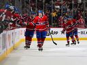 Montreal Canadiens defenseman Arber Xhekaj celebrates with his teammates after scoring the first goal of his NHL career during the second period against the Dallas Stars at the Bell Center on Saturday, Oct. 22, 2022.