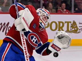 Canadiens goalie Jake Allen makes a save during the first period against the Minnesota Wild at the Bell Centre in Montreal on Oct. 25, 2022.