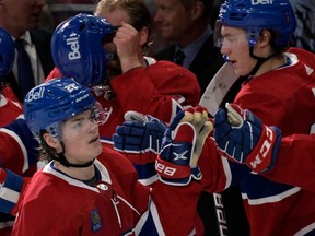 The Candiens’ Cole Caufield celebrates with teammates after scoring a goal against the Ottawa Senators during NHL preseason game at the Bell Centre on Oct. 4, 2022.