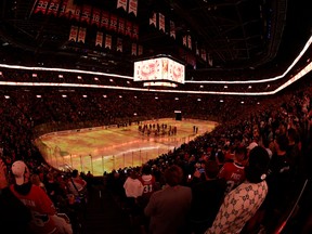 The Bell Centre lit in yellow