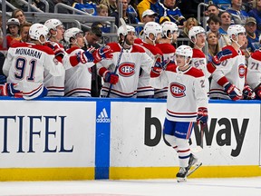 Montreal Canadiens right wing Cole Caufield (22) is congratulated by teammates after scoring against the St. Louis Blues during the second period at Enterprise Center on Oct. 29, 2022