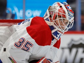 Canadiens goaltender Sam Montembeault stands on the ice during a timeout against the Capitals in the first period at Capital One Arena on Saturday, Oct. 15, 2022, in Washington, D.C.