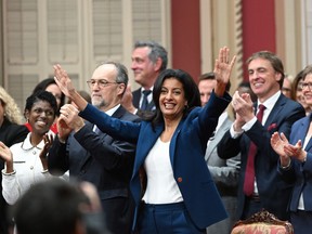Quebec Liberal Leader Dominique Anglade waves as she enters with her elected caucus to be sworn in during a ceremony at the legislature in Quebec City on Oct. 18, 2022. The chief organizer of the Liberal Party of Quebec, Jean-François Helms, says he will not renew his mandate.
