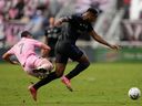 Montreal forward Mason Toye chases the ball past Inter Miami midfielder Jean Motta in the second half of a Major League Soccer game Sunday, Oct. 9, 2022 in Fort Lauderdale, Florida.
