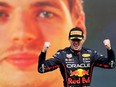 Red Bull's Max Verstappen celebrates on the podium after winning the Mexican Grand Prix and setting a new F1 record of 14 grand prix wins in a season on Sunday, Oct. 30, 2022, in Mexico City.