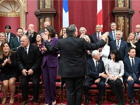 Quebec Premier François Legault thanks his new cabinet after they were sworn in, during a ceremony at the Quebec legislature, in Quebec City, Thursday, Oct. 20, 2022.