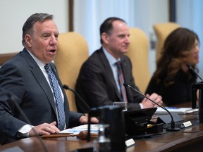 Quebec Premier François Legault presides over the first cabinet meeting of his re-elected CAQ government Oct. 26, 2022.