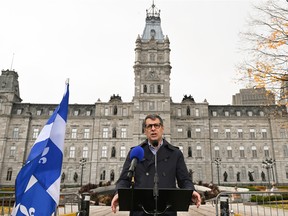 Conservative Party of Quebec Leader Éric Duhaime speaks at a news conference Wednesday, October 19, 2022 in front of the legislature in Quebec City.