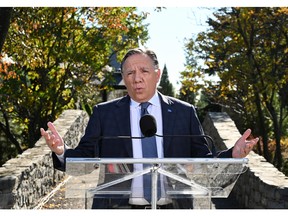 Quebec Premier and Coalition Avenir Quebec Leader Francois Legault speaks at a news conference on Tuesday, October 4, 2022  in Saint-Francois on the Ile dOrleans.