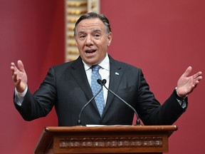 Premie François Legault shook up his old cabinet on Thursday, leaving some members in their old portfolios and giving other ministers new tasks.