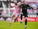 Inter Miami forward Gonzalo Higuain (10) and CF Montréal defender Joel Waterman (16) battle for the ball at DRV PNK Stadium on Sunday, Oct. 10, 2022, in Fort Lauderdale, Fla.