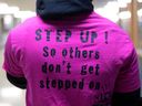 A student wears a pink anti-bullying shirt during Pink Shirt Day.
