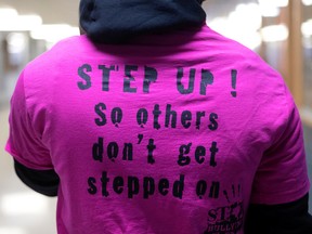 A student sports a Pink Shirt against bullying during Pink Shirt Day.