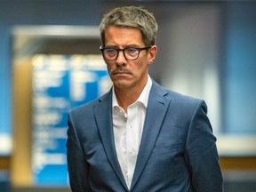 Former Parti Québécois leader André Boisclair waits for an elevator following his guilty plea on sexual assault charges in Montreal Monday June 20, 2022.