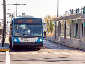 An STM bus waits at the 56th Ave. station during the opening of the SRB Pie-IX bus rapid transit project Nov. 2, 2022.