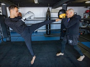 Jonathan Di Bella trains with his father, Angelo, at their kickboxing and karate school on St-Michel Blvd.