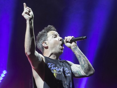 MONTREAL, QUE.: NOVEMBER 4, 2022 --  Simple Plan lead singer Pierre Bouvier during concert at the Bell Centre on Friday November 4, 2022.