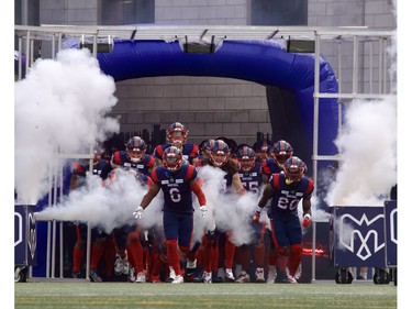 Players enter for the Eastern semifinal game between the Alouettes and Hamilton Tiger-Cats at Montreal's Percival Molson Memorial Stadium on Sunday, Nov. 6, 2022.