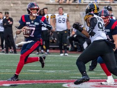 Alouettes quarterback Trevor Harris (7) looks down field against the Hamilton Tiger-Cats during second half CFL Eastern Conference semifinal action at Molson Stadium in Montreal on Sunday, Nov. 6, 2022.