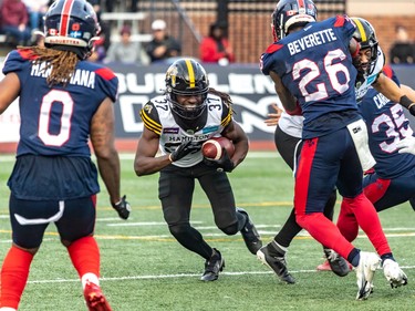 Hamilton Tiger-Cats defensive back Frankie Williams (37) runs into a Montreal Alouettes wall during 2nd half CFL Eastern Conference semifinal action at Percival Molson Stadium in Montreal on Sunday November 6, 2022. Dave Sidaway / Montreal Gazette