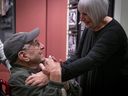 Sandy Fainer gives a hug to Paul Pitluk at the Montreal Holocaust Museum on Tuesday November 8, 2022. Their families are connected by a gift given from Zlatka Pitluk to Fania Fainer when both were prisoners at Auschwitz.