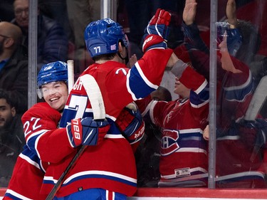Canadiens right wing Cole Caufield (22) celebrates with defenceman Arber Xhekaj (72) after scoring against the Vancouver Canucks during NHL action in Montreal on Wednesday, Nov. 9, 2022.