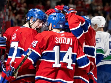 Canadiens centre Kirby Dach (77) celebrates scoring the Habs' fifth goal against Vancouver Canucks goaltender Thatcher Demko (35) during NHL action in Montreal on Wednesday, Nov. 9, 2022.