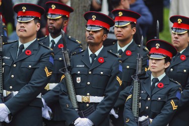 Members of the Black Watch Regiment stand at ease during Remembrance Day ceremony in Montreal on Friday, Nov. 11, 2022.