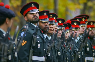 Members of the Black Watch Regiment get into formation for Remembrance Day ceremony in Montreal on Friday, Nov. 11, 2022.