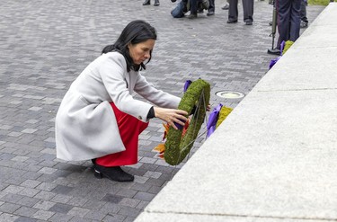 Montreal Mayor Valérie Plante lays a wreath during Remembrance Day ceremony in Montreal on Friday, Nov. 11, 2022.