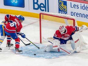 Montreal Canadiens goaltender Jake Allen (34) kicks the puck away against the Buffalo Sabres during 3rd period NHL action at the Bell Centre in Montreal on Tuesday Nov. 22, 2022.