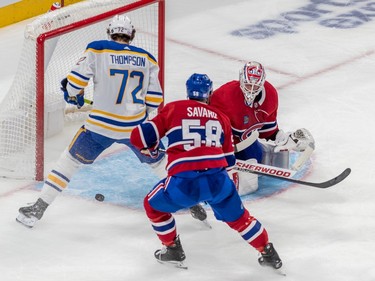 Buffalo Sabres right wing Tage Thompson (72) wasn't able to capitalize as the the puck went past Montreal Canadiens goaltender Jake Allen (34) and defenceman David Savard (58) during 2nd period NHL action at the Bell Centre in Montreal on Tuesday Nov. 22, 2022.