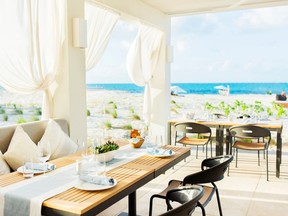 Wymara’s open-air bistro Zest offers casual Caribbean fare and a beachfront view.